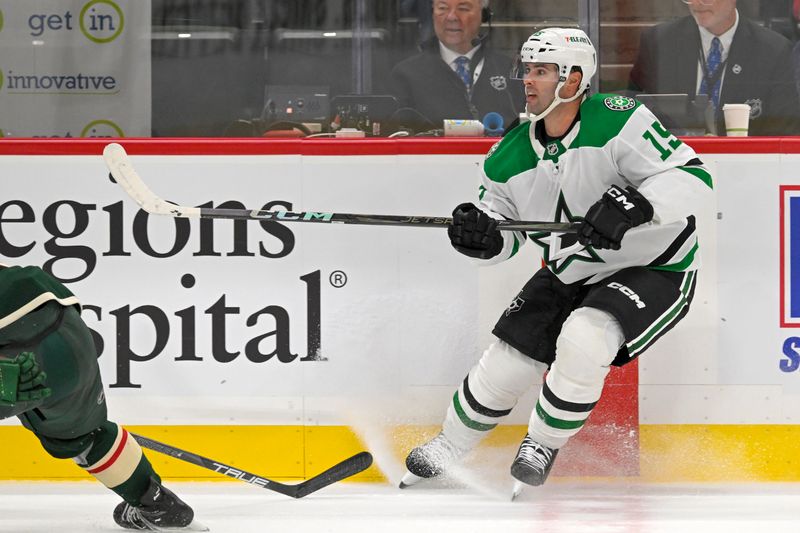 Sep 29, 2024; Saint Paul, Minnesota, USA;  Dallas Stars forward Colin Blackwell (15) scores an empty-net goal against the Minnesota Wild during the third period at Xcel Energy Center. Mandatory Credit: Nick Wosika-Imagn Images