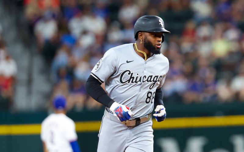 Jul 24, 2024; Arlington, Texas, USA; Chicago White Sox center fielder Luis Robert Jr. (88) runs the bases after hitting a home run during the third inning against the Texas Rangers at Globe Life Field. Mandatory Credit: Kevin Jairaj-USA TODAY Sports