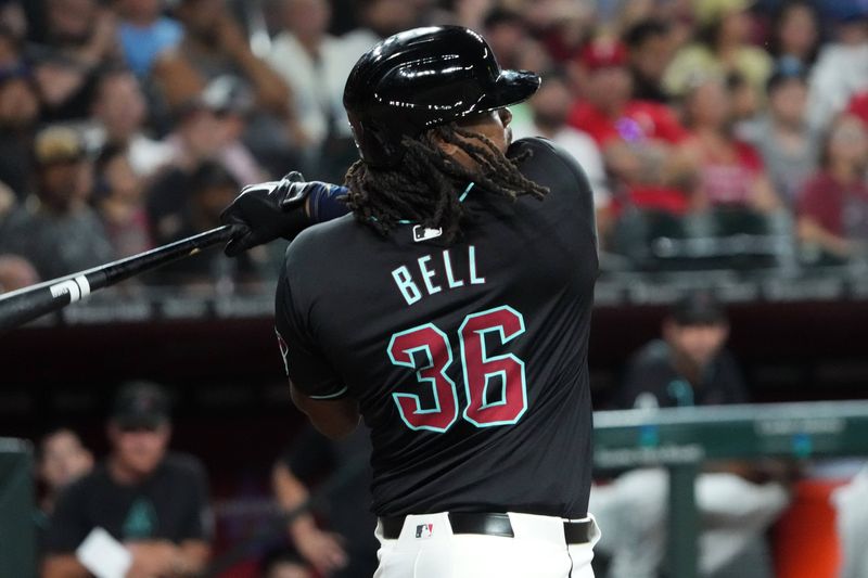 Aug 8, 2024; Phoenix, Arizona, USA; Arizona Diamondbacks first base Josh Bell (36) bats against the Philadelphia Phillies during the fourth inning at Chase Field. Mandatory Credit: Joe Camporeale-USA TODAY Sports