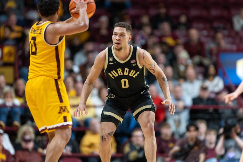 Jan 19, 2023; Minneapolis, Minnesota, USA; Purdue Boilermakers forward Mason Gillis (0) guards Minnesota Golden Gophers guard Taurus Samuels (0) in the second half at Williams Arena. Mandatory Credit: Matt Blewett-USA TODAY Sports