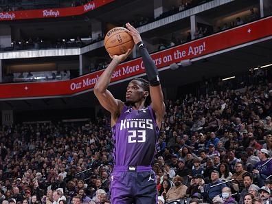 SACRAMENTO, CA - DECEMBER 16: Keon Ellis #23 of the Sacramento Kings shoots the ball during the game against the Utah Jazz on December 16, 2023 at Golden 1 Center in Sacramento, California. NOTE TO USER: User expressly acknowledges and agrees that, by downloading and or using this Photograph, user is consenting to the terms and conditions of the Getty Images License Agreement. Mandatory Copyright Notice: Copyright 2023 NBAE (Photo by Rocky Widner/NBAE via Getty Images)