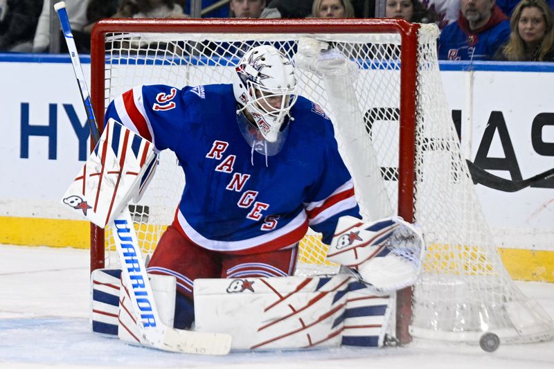 Mar 29, 2026; New York, New York, USA; New York Rangers goaltender Igor Shesterkin (31) watches the puck go wide of the net against the Florida Panthers during the second period at Madison Square Garden. Mandatory Credit: Dennis Schneidler-Imagn Images