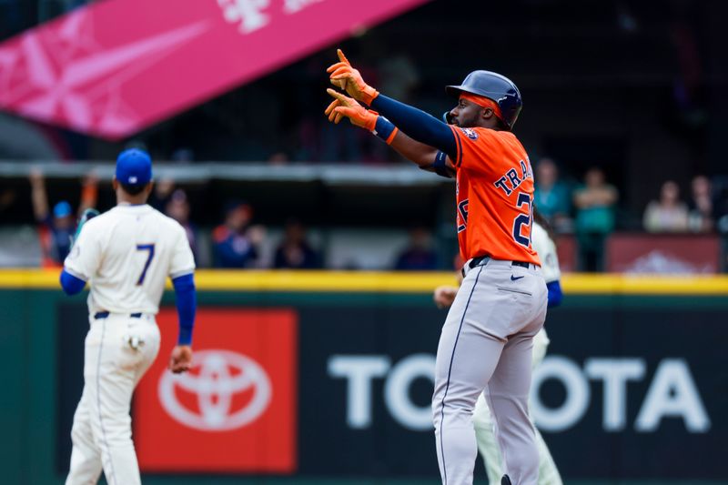 Jul 20, 2025; Seattle, Washington, USA; Houston Astros center fielder Taylor Trammell (26) reacts to the Astros dugout after hitting a two-run double against the Seattle Mariners during the seventh inning at T-Mobile Park. Mandatory Credit: Joe Nicholson-Imagn Images