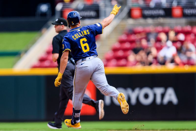 Jun 4, 2025; Cincinnati, Ohio, USA; Milwaukee Brewers outfielder Isaac Collins (6) reacts after hitting a three-run home run in the ninth inning against the Cincinnati Reds at Great American Ball Park. Mandatory Credit: Katie Stratman-Imagn Images