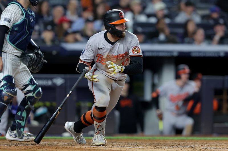 Sep 25, 2024; Bronx, New York, USA; Baltimore Orioles left fielder Colton Cowser (17) follows through on an RBI double against the New York Yankees during the fourth inning at Yankee Stadium. Mandatory Credit: Brad Penner-Imagn Images