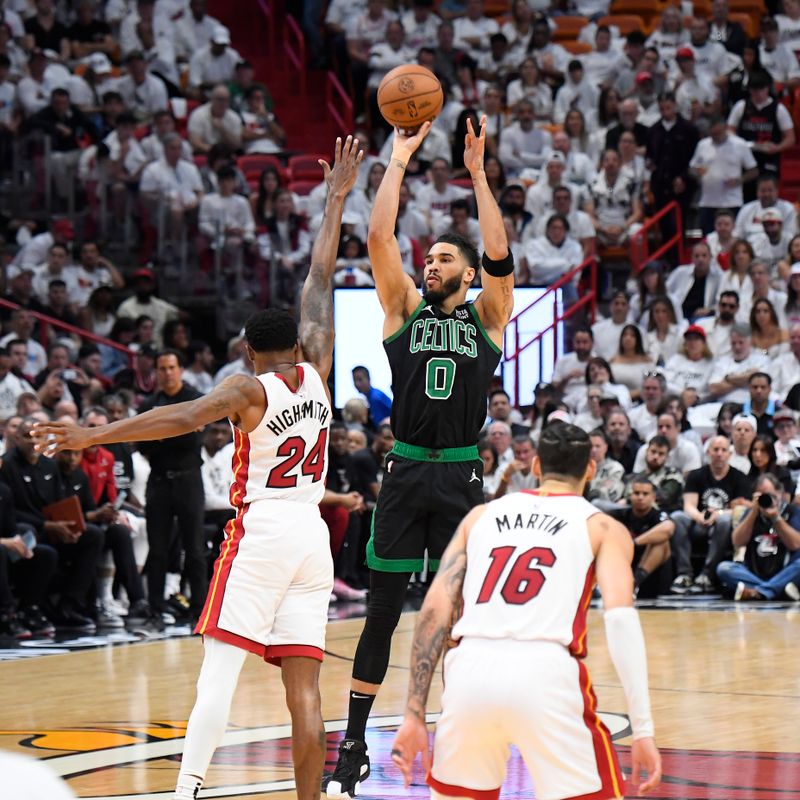 MIAMI, FL - APRIL 27: Jayson Tatum #0 of the Boston Celtics shoots a three point basket against the Miami Heat during Round 1 Game 3 of the 2024 NBA Playoffs on April 27, 2024 at Kaseya Center in Miami, Florida. NOTE TO USER: User expressly acknowledges and agrees that, by downloading and or using this Photograph, user is consenting to the terms and conditions of the Getty Images License Agreement. Mandatory Copyright Notice: Copyright 2024 NBAE (Photo by Brian Babineau/NBAE via Getty Images)