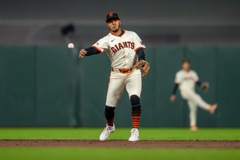 Apr 22, 2024; San Francisco, California, USA;  San Francisco Giants second baseman Thairo Estrada (39) throws out New York Mets catcher Omar Narváez (not pictured) during the sixth inning at Oracle Park. Mandatory Credit: Neville E. Guard-USA TODAY Sports