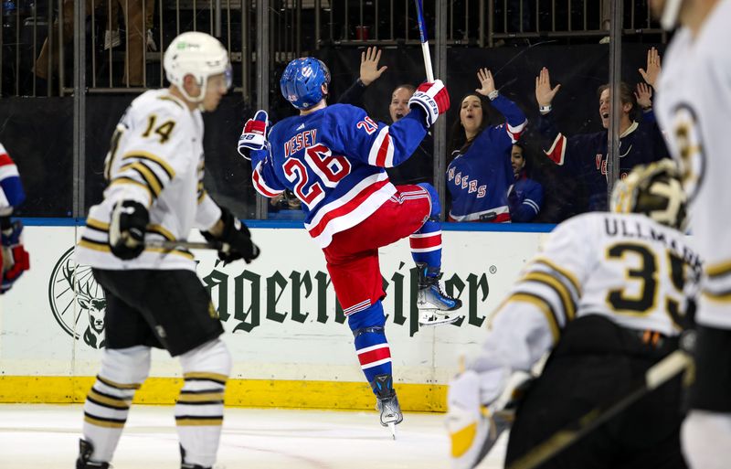 Nov 25, 2023; New York, New York, USA; New York Rangers left wing Jimmy Vesey (26) celebrates his goal against the Boston Bruins during the second period at Madison Square Garden. Mandatory Credit: Danny Wild-USA TODAY Sports