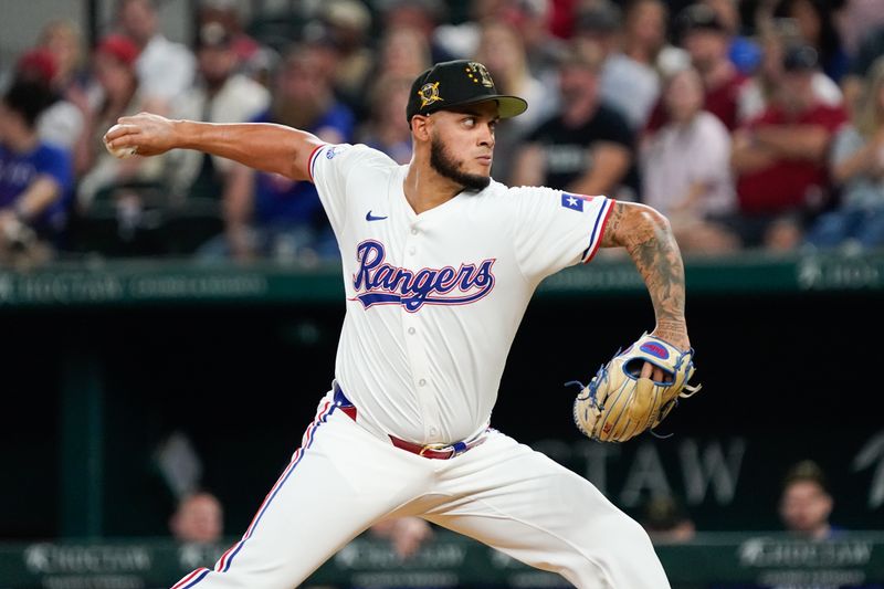 May 18, 2024; Arlington, Texas, USA; Texas Rangers relief pitcher Jonathan Hernandez (72) throws to the plate during the eighth inning against the Los Angeles Angels at Globe Life Field. Mandatory Credit: Raymond Carlin III-USA TODAY Sports