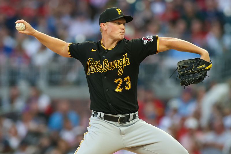 Sep 8, 2023; Atlanta, Georgia, USA; Pittsburgh Pirates starting pitcher Mitch Keller (23) throws against the Atlanta Braves in the second inning at Truist Park. Mandatory Credit: Brett Davis-USA TODAY Sports
