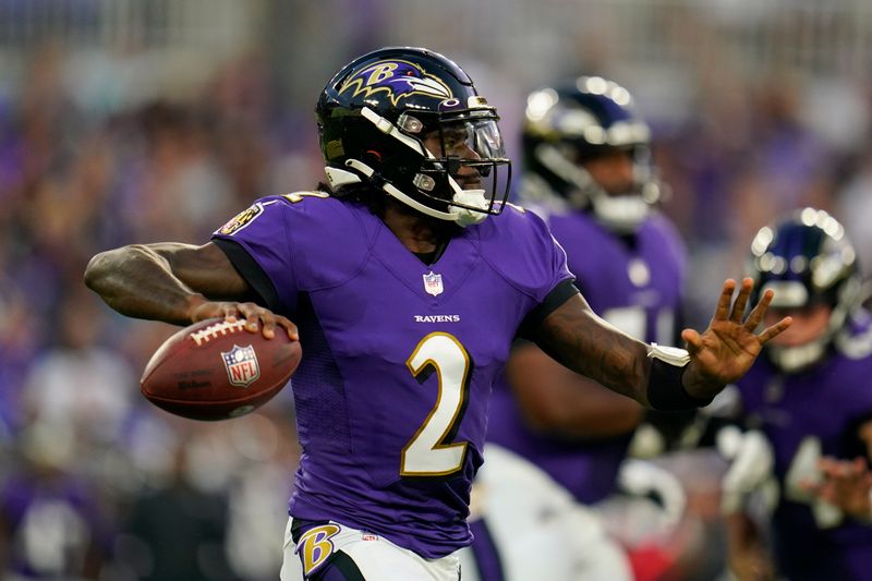 Baltimore Ravens quarterback Tyler Huntley throws to a receiver in the first half of a preseason NFL football game against the Washington Commanders, Saturday, Aug. 27, 2022, in Baltimore. (AP Photo/Julio Cortez)