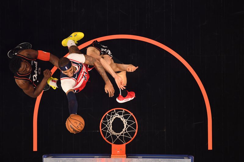 DETROIT, MI - JANUARY 27: Daniel Gafford #21 of the Washington Wizards drives to the basket during the game against the Detroit Pistons on January 27, 2024 at Little Caesars Arena in Detroit, Michigan. NOTE TO USER: User expressly acknowledges and agrees that, by downloading and/or using this photograph, User is consenting to the terms and conditions of the Getty Images License Agreement. Mandatory Copyright Notice: Copyright 2024 NBAE (Photo by Chris Schwegler/NBAE via Getty Images)