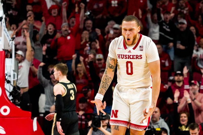 Jan 9, 2024; Lincoln, Nebraska, USA; Nebraska Cornhuskers guard C.J. Wilcher (0) celebrates after a 3-pointer against the Purdue Boilermakers during the second half at Pinnacle Bank Arena. Mandatory Credit: Dylan Widger-USA TODAY Sports