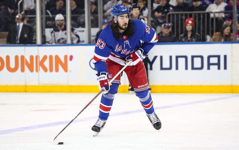 Jan 18, 2025; New York, New York, USA; New York Rangers center Mika Zibanejad (93) looks to pass against the Columbus Blue Jackets during the first period at Madison Square Garden. Mandatory Credit: Danny Wild-Imagn Images