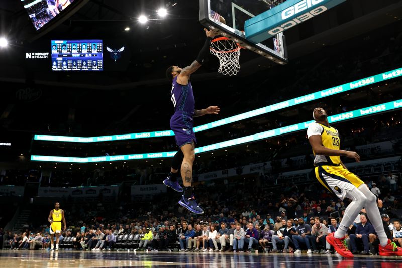 CHARLOTTE, NORTH CAROLINA - FEBRUARY 12: Miles Bridges #0 of the Charlotte Hornets lays the ball up during the first half of an NBA game against the Indiana Pacers at Spectrum Center on February 12, 2024 in Charlotte, North Carolina. NOTE TO USER: User expressly acknowledges and agrees that, by downloading and or using this photograph, User is consenting to the terms and conditions of the Getty Images License Agreement. (Photo by David Jensen/Getty Images)