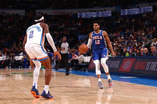 OKLAHOMA CITY, OK - NOVEMBER 25:  Tobias Harris #12 of the Philadelphia 76ers handles the ball during the game against the Oklahoma City Thunder on November 25, 2023 at Paycom Arena in Oklahoma City, Oklahoma. NOTE TO USER: User expressly acknowledges and agrees that, by downloading and or using this photograph, User is consenting to the terms and conditions of the Getty Images License Agreement. Mandatory Copyright Notice: Copyright 2023 NBAE (Photo by Zach Beeker/NBAE via Getty Images)