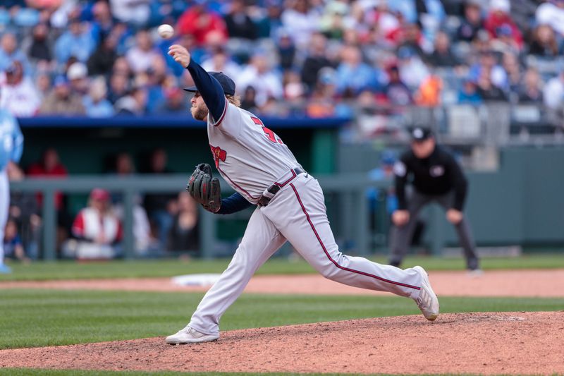 Apr 16, 2023; Kansas City, Missouri, USA; Atlanta Braves relief pitcher A.J. Minter (33) pitching during the ninth inning against the Kansas City Royals at Kauffman Stadium. Mandatory Credit: William Purnell-USA TODAY Sports