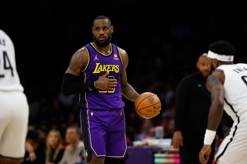 LOS ANGELES, CALIFORNIA - JANUARY 19:  LeBron James #23 of the Los Angeles Lakers in the first half at Crypto.com Arena on January 19, 2024 in Los Angeles, California.  NOTE TO USER: User expressly acknowledges and agrees that, by downloading and/or using this photograph, user is consenting to the terms and conditions of the Getty Images License Agreement.  (Photo by Ronald Martinez/Getty Images)