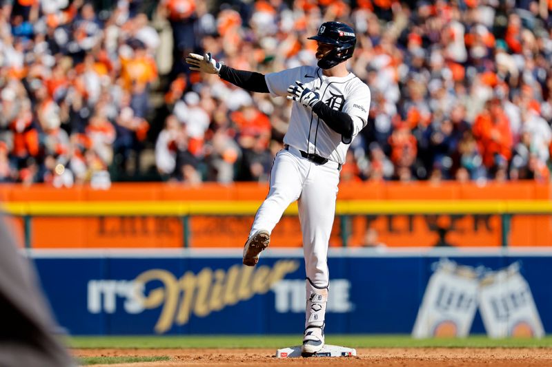 Oct 9, 2024; Detroit, Michigan, USA; Detroit Tigers catcher Jake Rogers (34) reacts after hitting a double against the Cleveland Guardians during the third inning during game three of the ALDS for the 2024 MLB Playoffs at Comerica Park. Mandatory Credit: Rick Osentoski-Imagn Images