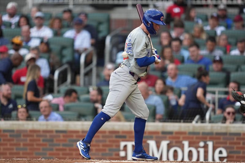 May 14, 2024; Cumberland, Georgia, USA; Chicago Cubs center fielder Pete Crow-Armstrong (52) is hit by a pitch against the Atlanta Braves during the third inning at Truist Park. Mandatory Credit: Dale Zanine-USA TODAY Sports