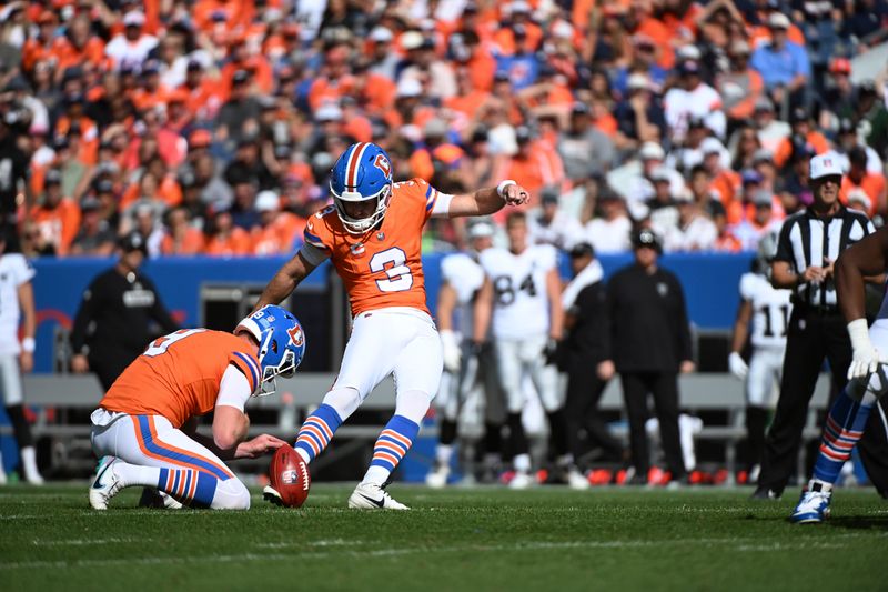 Denver Broncos place kicker Wil Lutz kicks a field goal during the first half of an NFL football game against the Las Vegas Raiders, Sunday, Oct. 6, 2024, in Denver. (AP Photo/Geneva Heffernan)