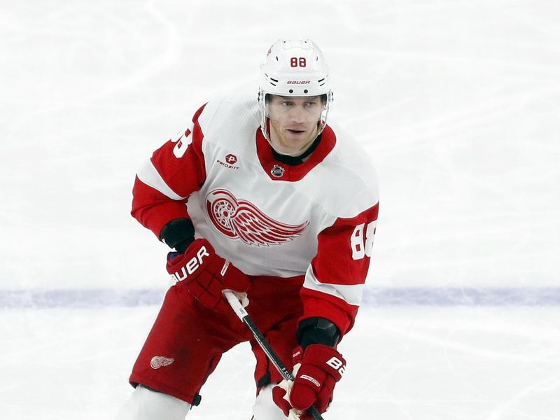 Mar 17, 2024; Pittsburgh, Pennsylvania, USA;  Detroit Red Wings right wing Patrick Kane (88) skates with the puck against the Pittsburgh Penguins during the third period at PPG Paints Arena. Pittsburgh won 6-3. Mandatory Credit: Charles LeClaire-USA TODAY Sports
