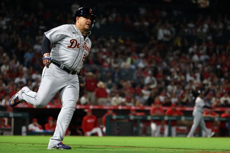 Sep 16, 2023; Anaheim, California, USA;  Detroit Tigers designated hitter Miguel Cabrera (24) hits an RBI single during the tenth inning against the Los Angeles Angels at Angel Stadium. Mandatory Credit: Kiyoshi Mio-USA TODAY Sports