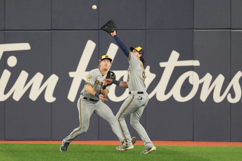 May 31, 2023; Toronto, Ontario, CAN; Milwaukee Brewers right fielder catches a fly ball for an out against the Toronto Blue Jays Brian Anderson (9) during the sixth inning inning at Rogers Centre. Mandatory Credit: Nick Turchiaro-USA TODAY Sports