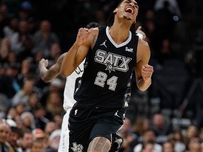 SAN ANTONIO, TX - DECEMBER 26:  Devin Vassell #24 of the San Antonio Spurs reacts after he missed a steal on Jordan Clarkson #00 of the Utah Jazz ( not in frame)  in the first half at Frost Bank Center on December  26, 2023 in San Antonio, Texas. NOTE TO USER: User expressly acknowledges and agrees that, by downloading and or using this photograph, User is consenting to terms and conditions of the Getty Images License Agreement. (Photo by Ronald Cortes/Getty Images)