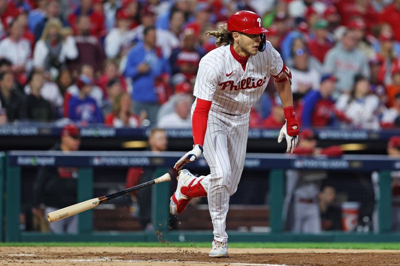 Oct 23, 2023; Philadelphia, Pennsylvania, USA; Philadelphia Phillies first baseman Alec Bohm (28) hits a single during the third inning against the Arizona Diamondbacks in game six of the NLCS for the 2023 MLB playoffs at Citizens Bank Park. Mandatory Credit: Bill Streicher-USA TODAY Sports