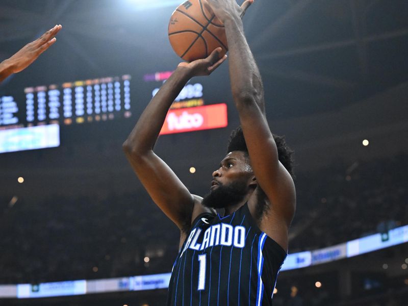 CLEVELAND, OHIO - APRIL 20: Jonathan Isaac #1 of the Orlando Magic shoots during the first quarter game one of the Eastern Conference First Round Playoffs against the Cleveland Cavaliers at Rocket Mortgage Fieldhouse on April 20, 2024 in Cleveland, Ohio. NOTE TO USER: User expressly acknowledges and agrees that, by downloading and or using this photograph, User is consenting to the terms and conditions of the Getty Images License Agreement. (Photo by Jason Miller/Getty Images)