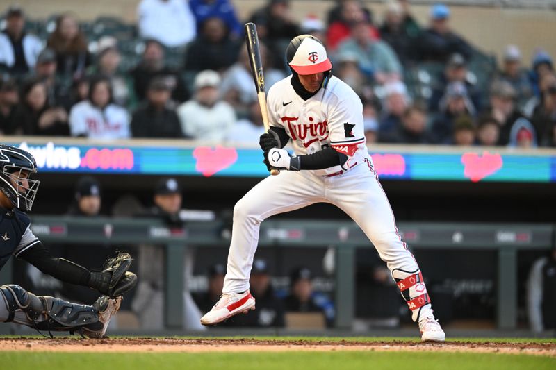 Apr 25, 2023; Minneapolis, Minnesota, USA; Minnesota Twins third baseman Jose Miranda (64) reacts to a pitch from New York Yankees starting pitcher Nestor Cortes (65) during the third inning at Target Field. Mandatory Credit: Jeffrey Becker-USA TODAY Sports