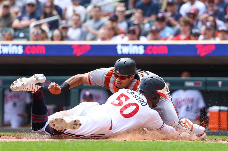 May 24, 2023; Minneapolis, Minnesota, USA; Minnesota Twins left fielder Willi Castro (50) steals home against San Francisco Giants catcher Blake Sabol (2) during the third inning at Target Field. Mandatory Credit: Matt Krohn-USA TODAY Sports