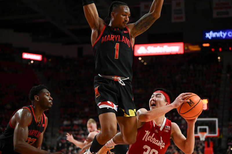 Jan 27, 2024; College Park, Maryland, USA; Maryland Terrapins guard Jahmir Young (1) leaps to block \a30]\ shot during the fist half at Xfinity Center. Mandatory Credit: Tommy Gilligan-USA TODAY Sports