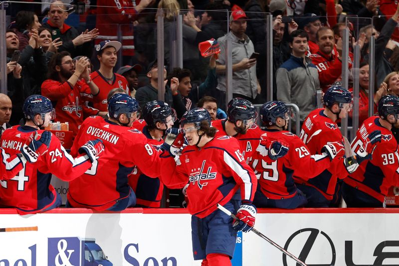 Mar 1, 2024; Washington, District of Columbia, USA; Washington Capitals left wing Sonny Milano (15) celebrates with teammates after scoring a goal against the Philadelphia Flyers in the second period at Capital One Arena. Mandatory Credit: Geoff Burke-USA TODAY Sports