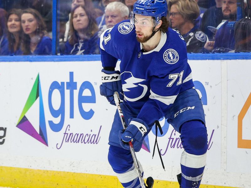 Jan 13, 2024; Tampa, Florida, USA;  Tampa Bay Lightning center Anthony Cirelli (71) controls the puck against the Anaheim Ducks in the first period at Amalie Arena. Mandatory Credit: Nathan Ray Seebeck-USA TODAY Sports