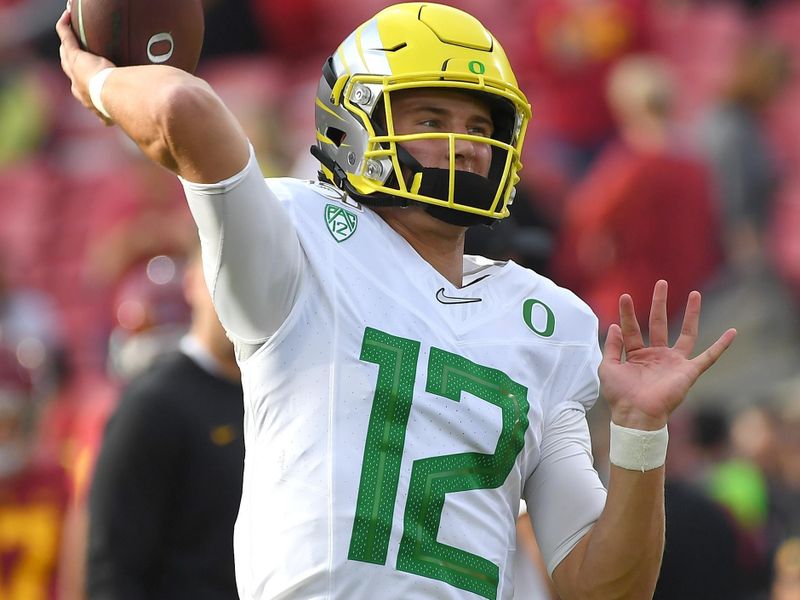 Nov 2, 2019; Los Angeles, CA, USA;   Oregon Ducks quarterback Tyler Shough (12) warms up before the game against the USC Trojans at Los Angeles Memorial Coliseum. Mandatory Credit: Jayne Kamin-Oncea-USA TODAY Sports