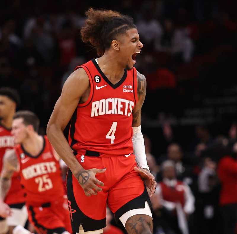 HOUSTON, TEXAS - JANUARY 23: Jalen Green #4 of the Houston Rockets reacts after making a three point basket against the Minnesota Timberwolves during the fourth quarter at Toyota Center on January 23, 2023 in Houston, Texas.  NOTE TO USER: User expressly acknowledges and agrees that, by downloading and or using this photograph, User is consenting to the terms and conditions of the Getty Images License Agreement. (Photo by Bob Levey/Getty Images)