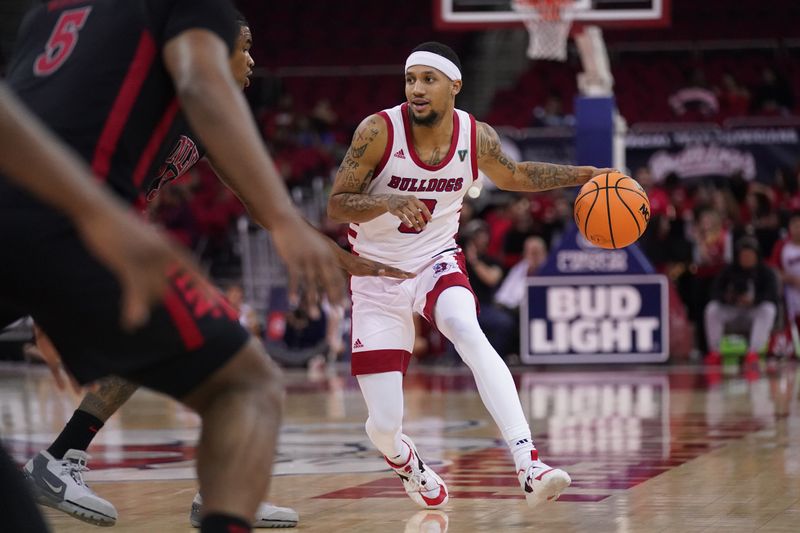 Feb 14, 2024; Fresno, California, USA; Fresno State Bulldogs guard Isaiah Hill (3) dribbles the ball against the UNLV Rebels in the second half at the Save Mart Center. Mandatory Credit: Cary Edmondson-USA TODAY Sports