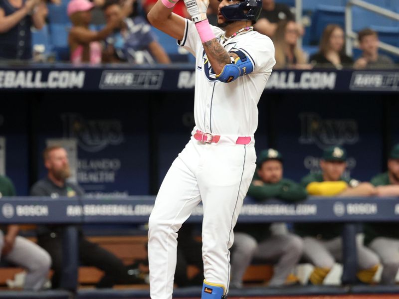 May 30, 2024; St. Petersburg, Florida, USA; Tampa Bay Rays outfielder Jose Siri (22) reacts after hitting a home run against the Oakland Athletics during the second inning at Tropicana Field. Mandatory Credit: Kim Klement Neitzel-USA TODAY Sports