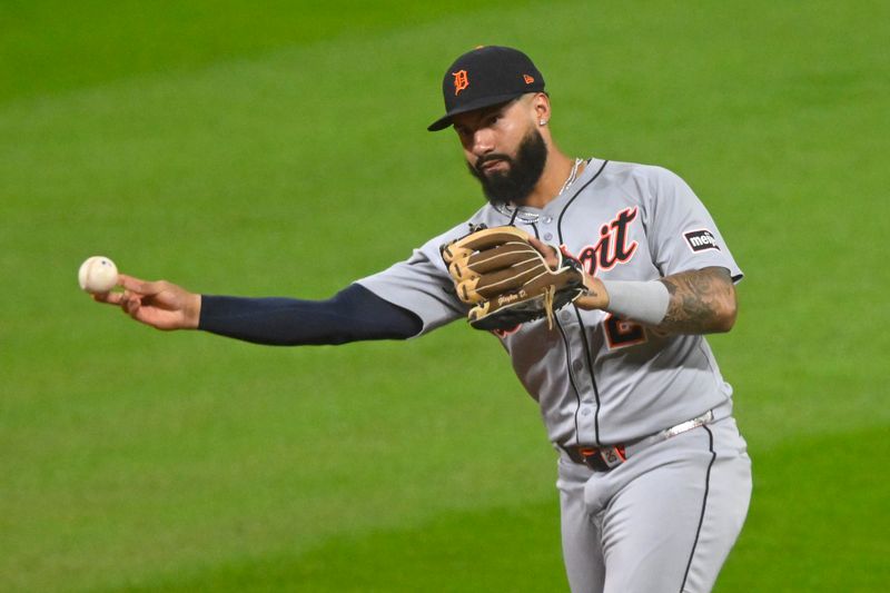 Sep 24, 2025; Cleveland, Ohio, USA; Detroit Tigers second baseman Gleyber Torres (25) throws to first base in the third inning against the Cleveland Guardians at Progressive Field. Mandatory Credit: David Richard-Imagn Images