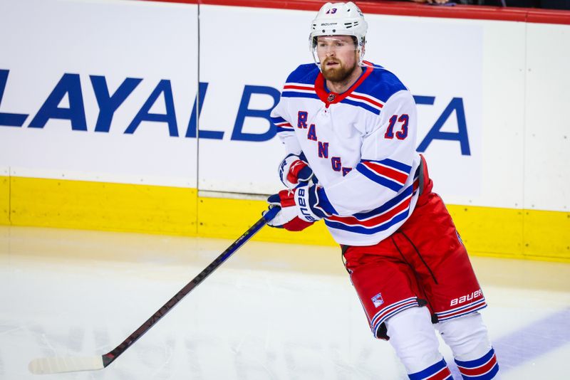 Oct 24, 2023; Calgary, Alberta, CAN; New York Rangers left wing Alexis Lafreniere (13) skates during the warmup period against the Calgary Flames at Scotiabank Saddledome. Mandatory Credit: Sergei Belski-USA TODAY Sports