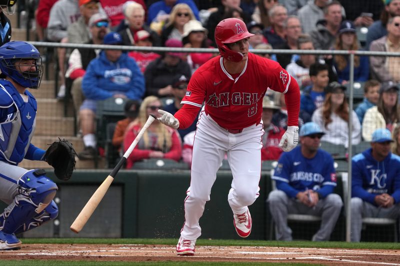 Mar 14, 2025; Tempe, Arizona, USA; Los Angeles Angels outfielder Mickey Moniak (8) hits a single again st the Kansas City Royals in the first inning at Tempe Diablo Stadium. Mandatory Credit: Rick Scuteri-Imagn Images