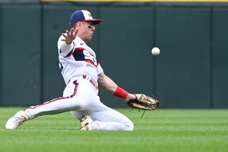 Jun 11, 2023; Chicago, Illinois, USA;   Chicago White Sox second baseman Romy Gonzalez (15) can   t make the play on a ball hit by Miami Marlins center fielder Jonathan Davis (49) at during the seventh inning Guaranteed Rate Field. Mandatory Credit: Matt Marton-USA TODAY Sports