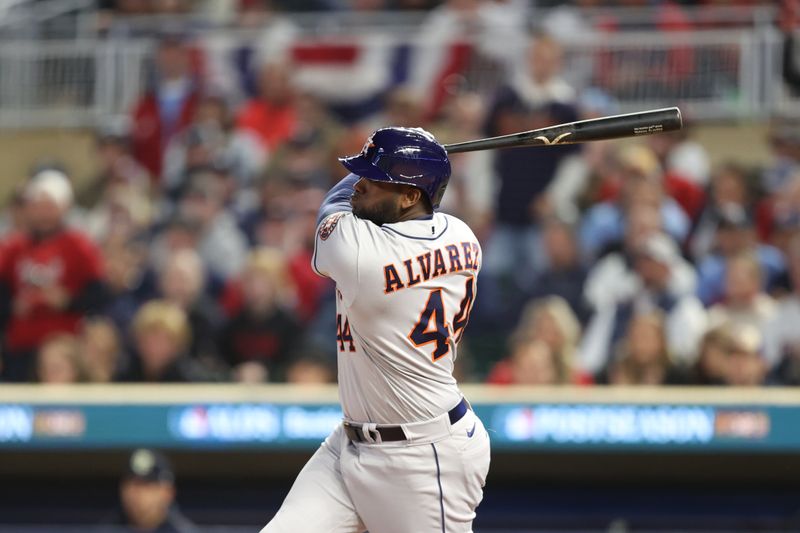 Oct 11, 2023; Minneapolis, Minnesota, USA; Houston Astros left fielder Yordan Alvarez (44) hits a single in the fourth inning against the Minnesota Twins during game four of the ALDS for the 2023 MLB playoffs at Target Field. Mandatory Credit: Jesse Johnson-USA TODAY Sports