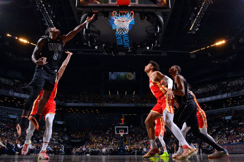 BROOKLYN, NY - FEBRUARY 29: Lonnie Walker IV #8 of the Brooklyn Nets drives to the basket during the game against the Atlanta Hawks on February 29, 2024 at Barclays Center in Brooklyn, New York. NOTE TO USER: User expressly acknowledges and agrees that, by downloading and or using this Photograph, user is consenting to the terms and conditions of the Getty Images License Agreement. Mandatory Copyright Notice: Copyright 2024 NBAE (Photo by Jesse D. Garrabrant/NBAE via Getty Images)