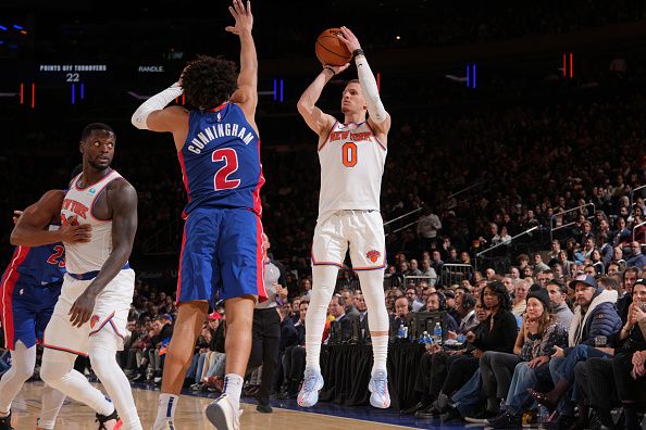 NEW YORK, NY - NOVEMBER 30: Donte Divincenzo #0 of the New York Knicks shoots the ball during the game against the Detroit Pistons on November 30, 2023 at Madison Square Garden in New York City, New York.  NOTE TO USER: User expressly acknowledges and agrees that, by downloading and or using this photograph, User is consenting to the terms and conditions of the Getty Images License Agreement. Mandatory Copyright Notice: Copyright 2023 NBAE  (Photo by Jesse D. Garrabrant/NBAE via Getty Images)