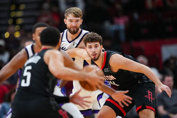 HOUSTON, TEXAS - NOVEMBER 04: Alperen Sengun #28 of the Houston Rockets and Domantas Sabonis #10 of the Sacramento Kings look on during the first quarter of the game at Toyota Center on November 04, 2023 in Houston, Texas. NOTE TO USER: User expressly acknowledges and agrees that, by downloading and or using this photograph, User is consenting to the terms and conditions of the Getty Images License Agreement. (Photo by Alex Bierens de Haan/Getty Images)