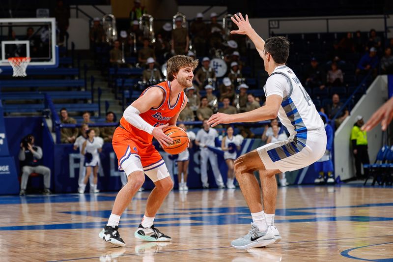 Jan 31, 2023; Colorado Springs, Colorado, USA; Boise State Broncos guard Max Rice (12) controls the ball as Air Force Falcons forward Beau Becker (14) guards in the first half at Clune Arena. Mandatory Credit: Isaiah J. Downing-USA TODAY Sports