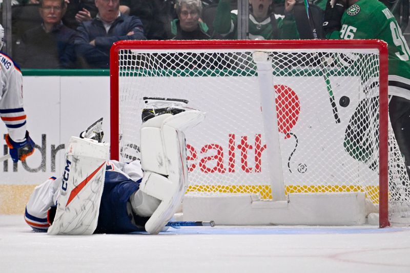 Nov 4, 2025; Dallas, Texas, USA; Edmonton Oilers goaltender Stuart Skinner (74) allows the game tying goal to Dallas Stars defenseman Miro Heiskanen (not pictured) during the third period at the American Airlines Center. Mandatory Credit: Jerome Miron-Imagn Images